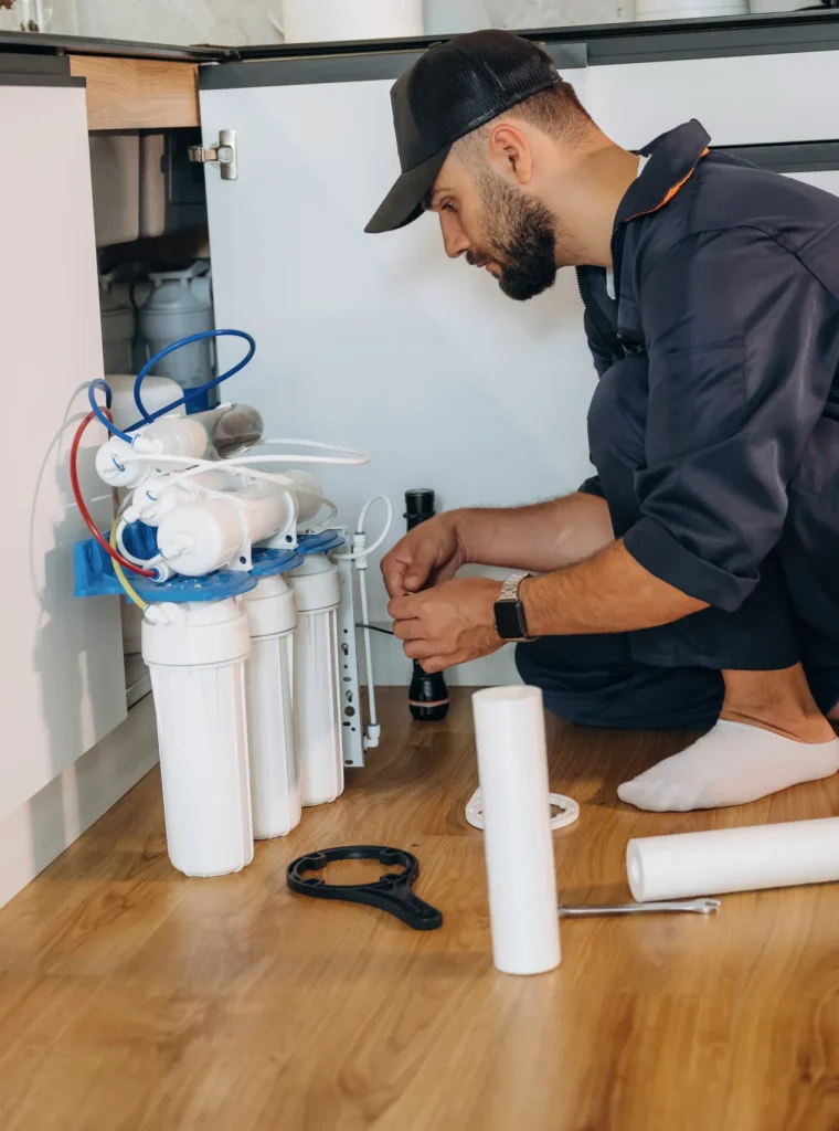 installing-new-filters-plumber-working-in-the-kit-2026-01-09-13-51-31-utc